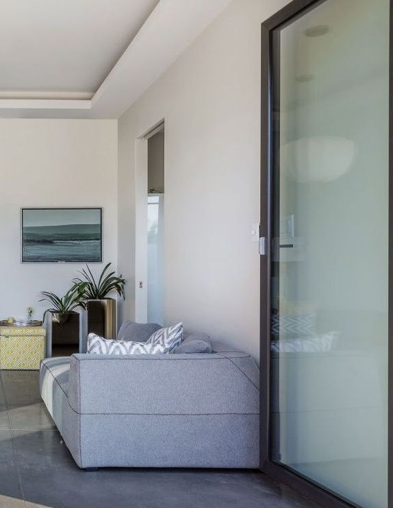 Modern Living Room Design With Glass Doors
