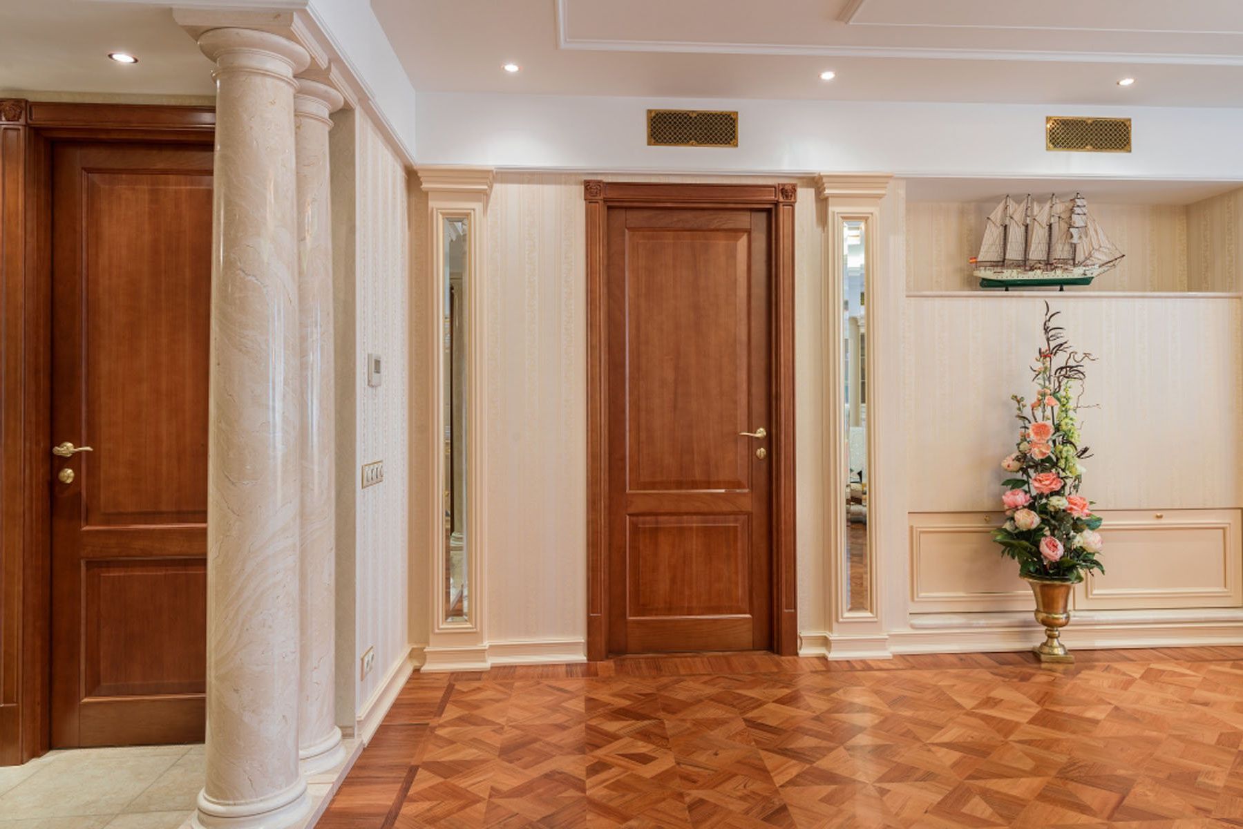 The massive door of solid wood in a classic room design