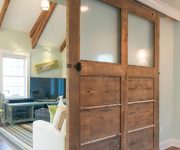 Wooden rolling interior door