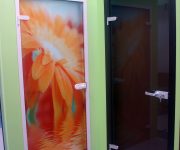 Orange glass door with flower pattern and brown glass interior door