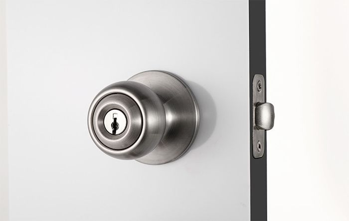 The metal door handle and lock for plastic interior doors