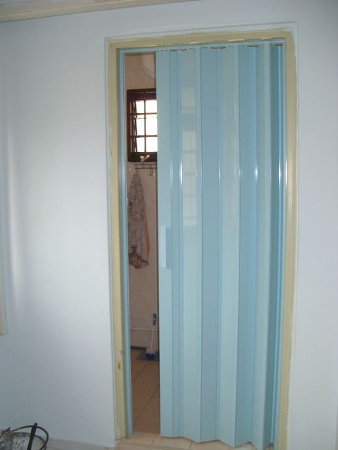 White plastic folding doors