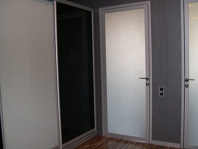 Modern design aluminum interior doors in the apartment