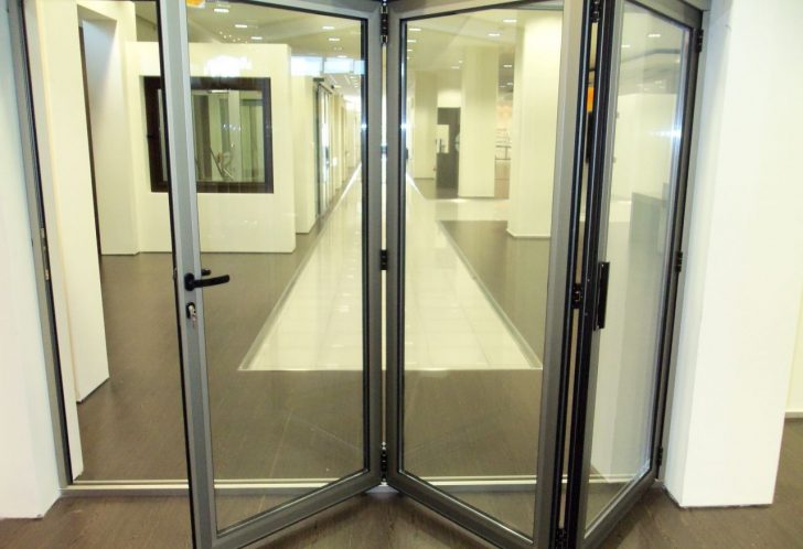 folding interior aluminum door with glass 728x498 - Aluminium interior and entrance doors