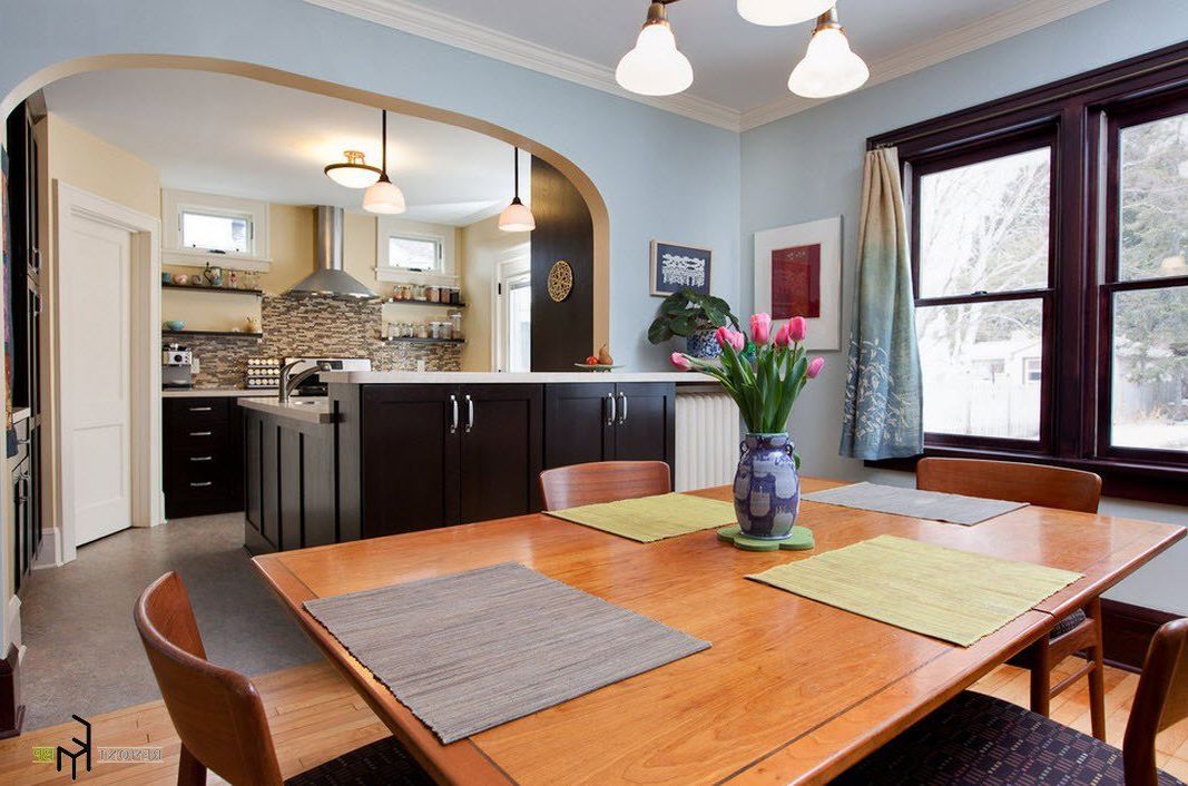 Kitchen With Arch In Dining Room