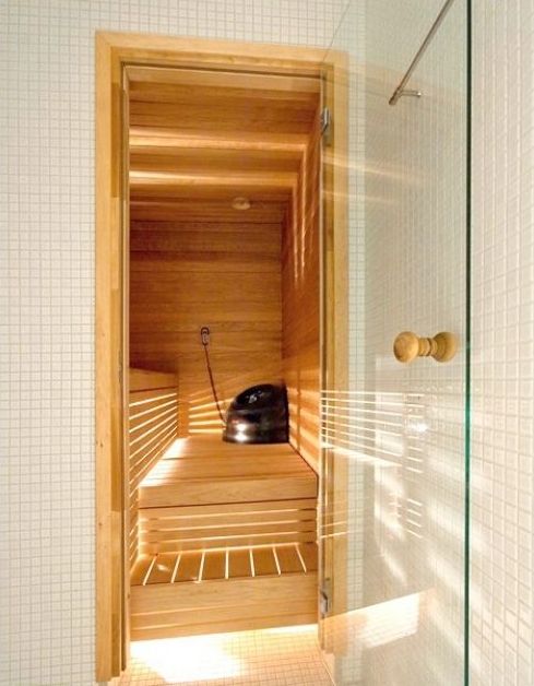 Hinged glass door for saunas