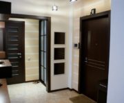 Interior with Dark Doors and Light Floor