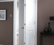 Modern white bi folding interior door