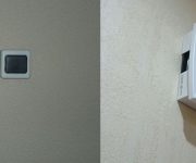 The installation of the doorbell button.