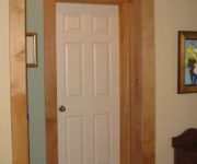 White interior doors with stained wood trim photo