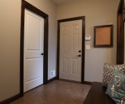 White interior doors with wood trim photo
