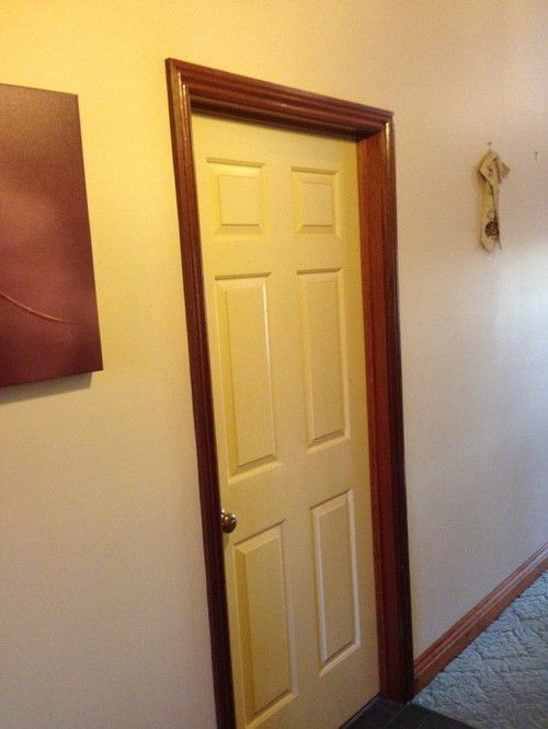 White interior doors with wood trim