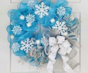 Blue Christmas wreath from tulle and white paper snowflakes