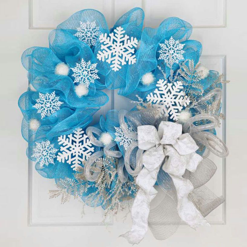 Blue Christmas wreath from tulle and white paper snowflakes