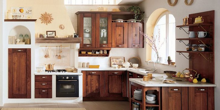 Cabinets made of natural wood in the kitchen in the Italian style 728x364 - Italian Kitchen Decor - the charm of tradition