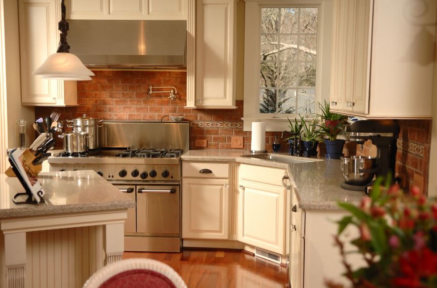 Brick wall in the kitchen in country style