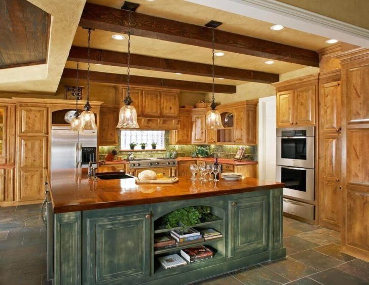 Built in spotlights and chandelier in the interior design of the country style kitchen 728x563 - Country-Style Kitchens