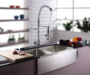 Modern faucet in the kitchen in high-tech style