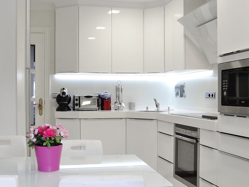 Modern white kitchen in high-tech style