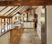 The stone floor in the kitchen in country style 180x150 - Country-Style Kitchens